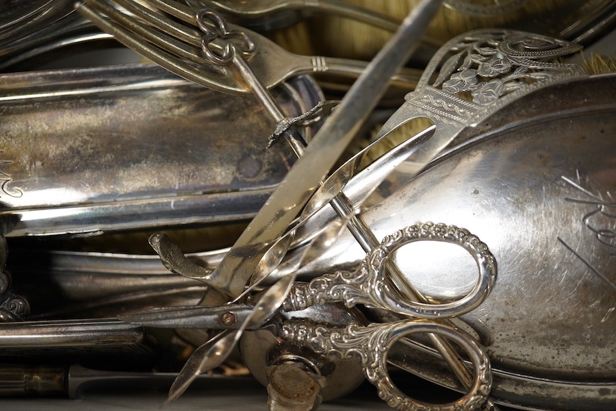 A group of assorted silver etc. including a mounted hand mirror and two brushes, two card cases (both a.f.), caddy spoon, fruit knife, page turners (a.f.), shoe pin cushion, cased folding comb and other mainly damaged it